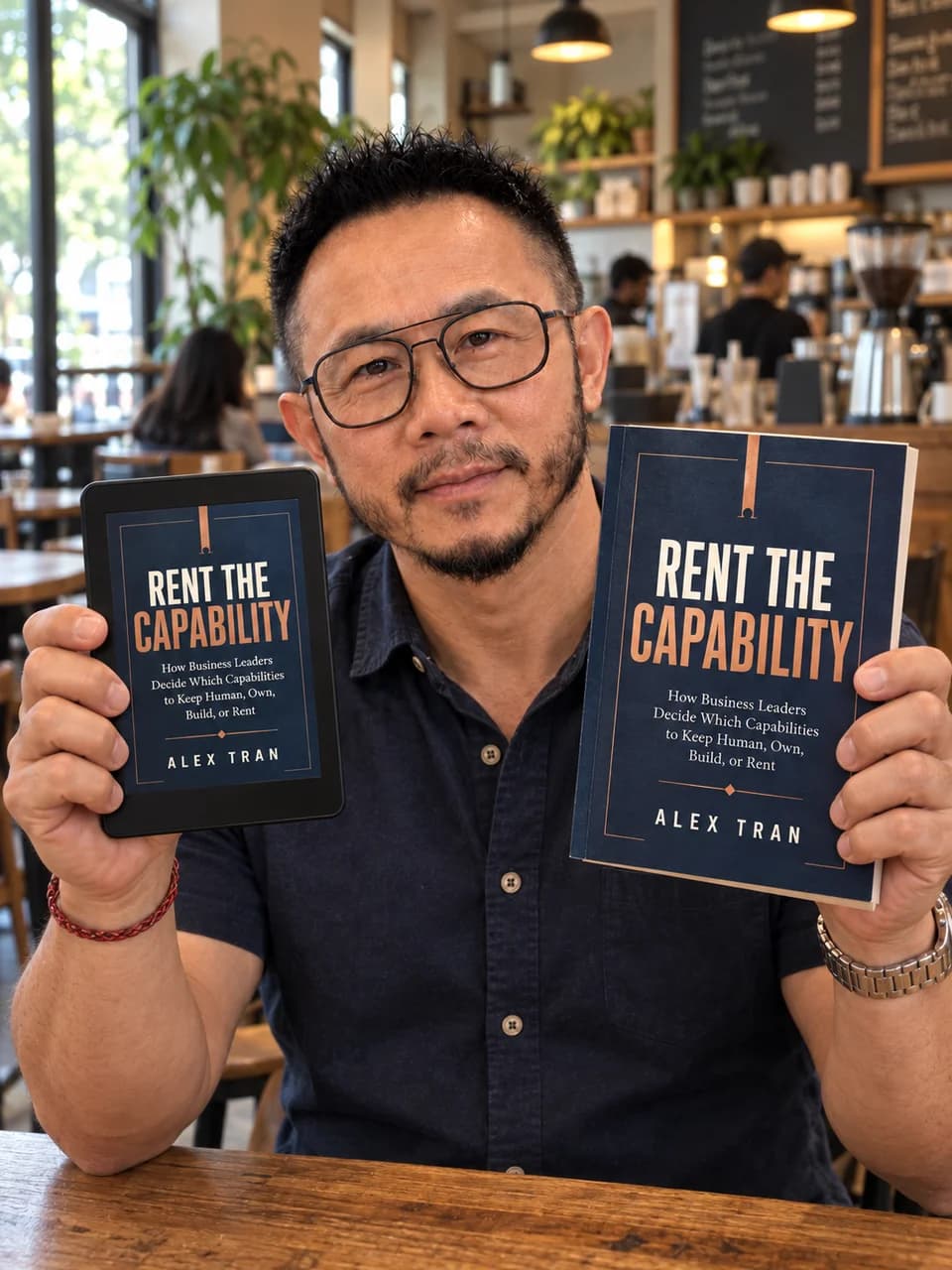 Alex Tran holding Rent the Capability